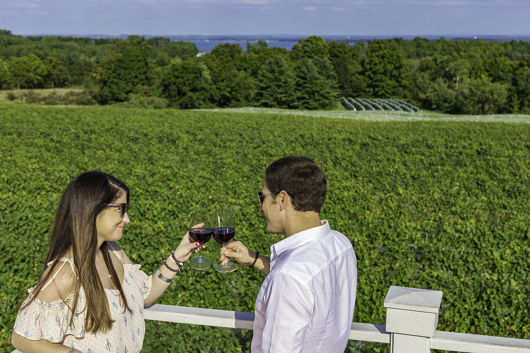 couple enjoying the lake views on traverse city's wine trail